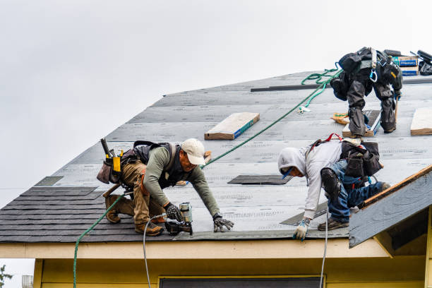 Professional Roofing technician working in California, MD